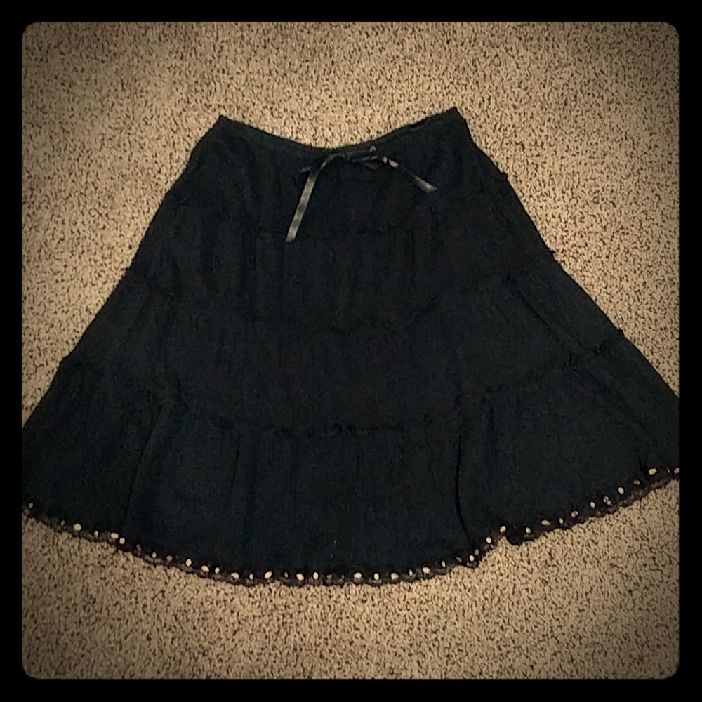 Black skirt with ruffles and beading